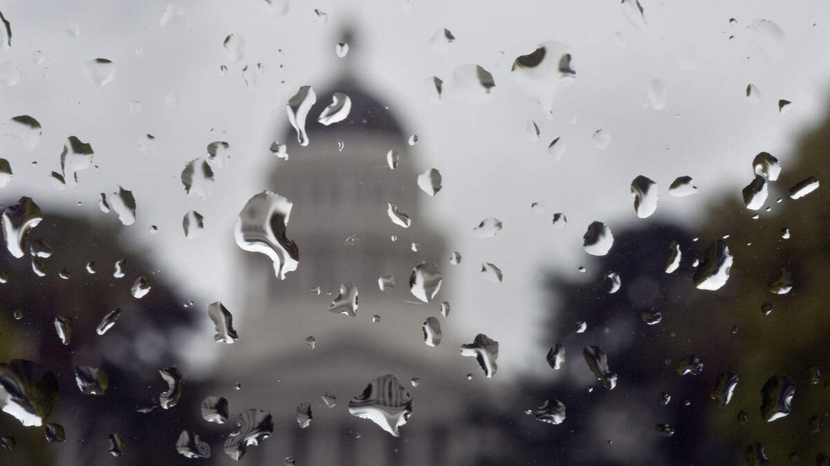 The State Capitol is contrasted by raindrops on a car window in Sacramento, Calif. on Wednesday, March 20, 2013.